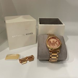 Rose-gold Michael Kors watch. **Used**